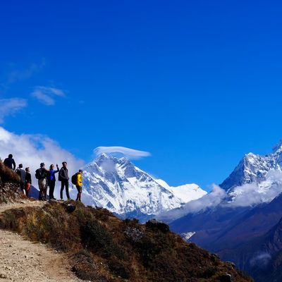 Ours. Dez and Bren group shot EBC trek trail Ama Dablam